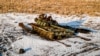 Знищений Силами оборони України танк армії РФ на пшеничному полі. Харківщина, 22 лютого 2023 року, ілюстративне фото