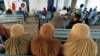 The letter argues that the treatment of Afghan women under the Taliban constitutes a gender apartheid because "they are systematically deprived of basic freedoms and human and citizenship rights."
