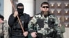 Ramzan Kadîrov inspectează forțele militare cecene în data de 29 martie 2022. El a participat direct, alături de luptători ceceni, descriși drept cruzi și brutali, la atacurile ruse din Ucraina.