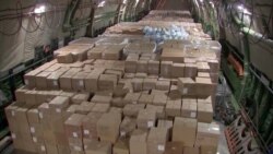 Російський військово-транспортний літак з медичним обладнанням, перед вильотом до США, 1 квітня