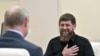 Рамзан Кадиров (п) і спина Володимира Путіна, серпень 2019 року