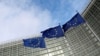 FILE PHOTO: EU flags fly outside the European Commission in Brussels