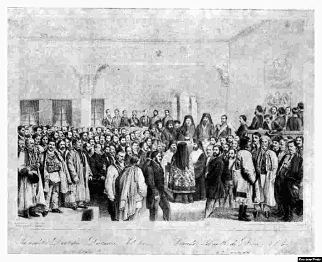 Litografie reprezentând Divanul Ad Hoc al Țării Românești, 1857. În Muntenia nu a existat o încercare de falsificare a alegerilor ca în Moldova așa că lucrările au început mai repede. Pentru adunarea de la Iași, după frauda lui Nicolae Vogoride, denunțată vehement inclusiv de Al. Ioan Cuza, alegerile au fost reluate.&nbsp;