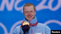 Йоханес Бьо с един от златните медали